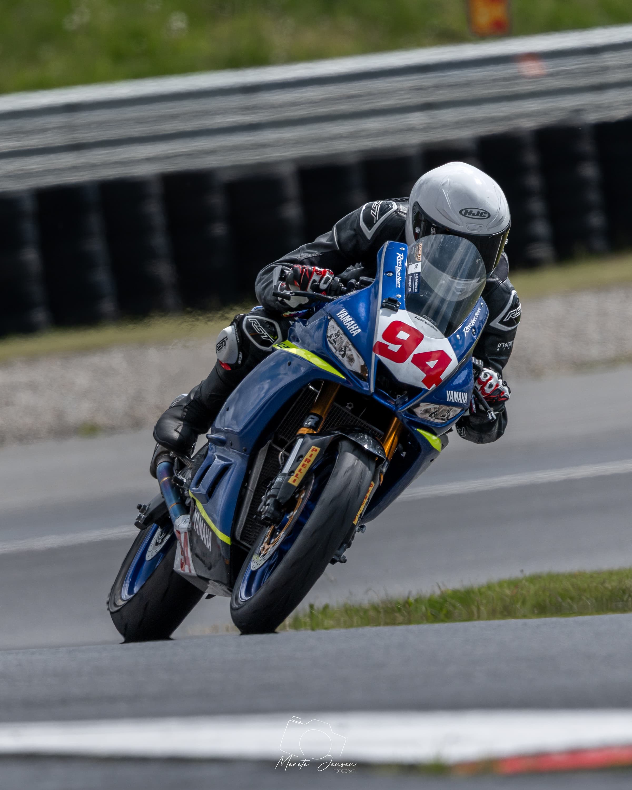 Road racing motorcycle exiting a corner on the circuit